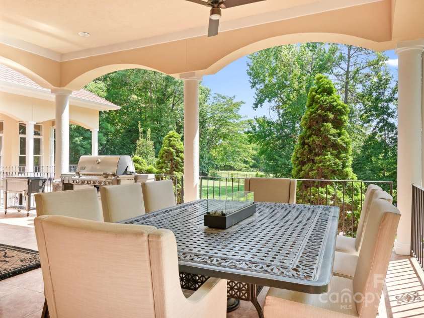 149 Vista Bluff Lane, Mooresville, NC 28117.  MLS# CAR4276049, YatesRealty ID 30753. Covered terrace