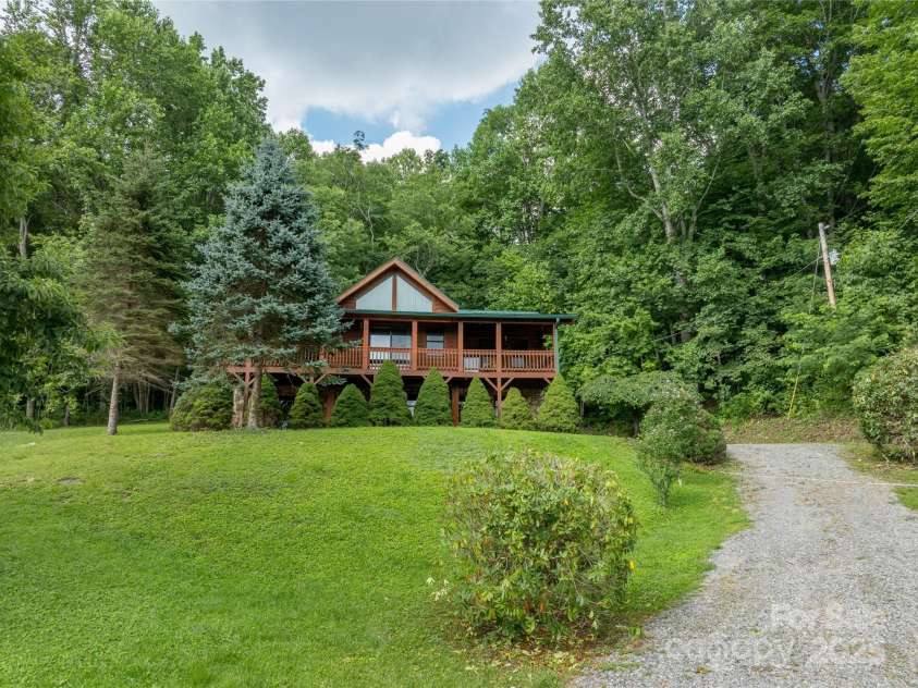 125 Apple Blossom Lane, Maggie Valley, NC 28751.  MLS# CAR4285766, YatesRealty ID 30755. 2-car garage on the lower level