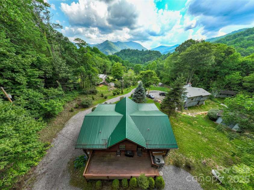 125 Apple Blossom Lane, Maggie Valley, NC 28751.  MLS# CAR4285766, YatesRealty ID 30755. Look at the views in the distance - drone enhancement