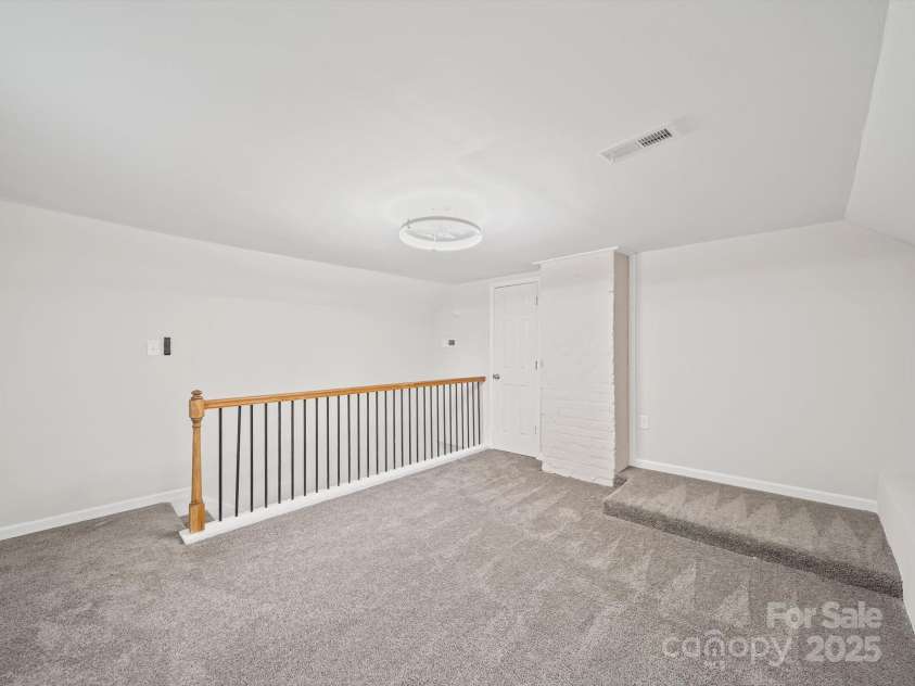 5 Cooper Street, Salisbury, NC 28144.  MLS# CAR4282765, YatesRealty ID 30757. Upstairs Bedroom/Bonus Room