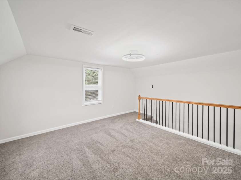 5 Cooper Street, Salisbury, NC 28144.  MLS# CAR4282765, YatesRealty ID 30757. Upstairs Bedroom/Bonus Room