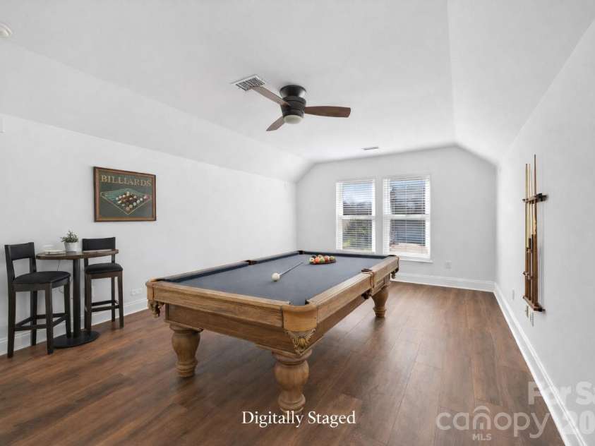 15725 Chipping Drive, Huntersville, NC 28078.  MLS# CAR4335017, YatesRealty ID 3076. Virtually staged bedroom as a rec room