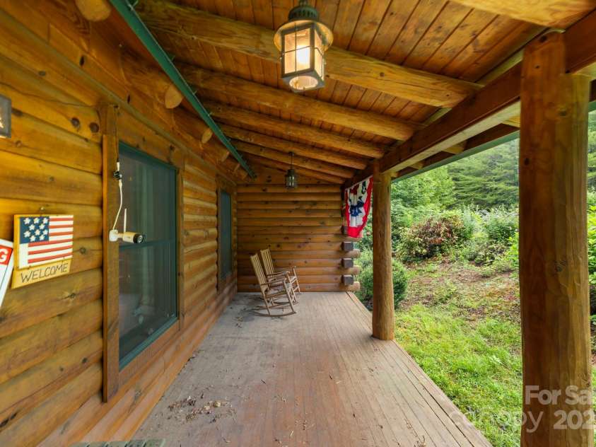 266 Rhododendron Drive, Saluda, NC 28773.  MLS# CAR4288597, YatesRealty ID 30762. Covered front porch