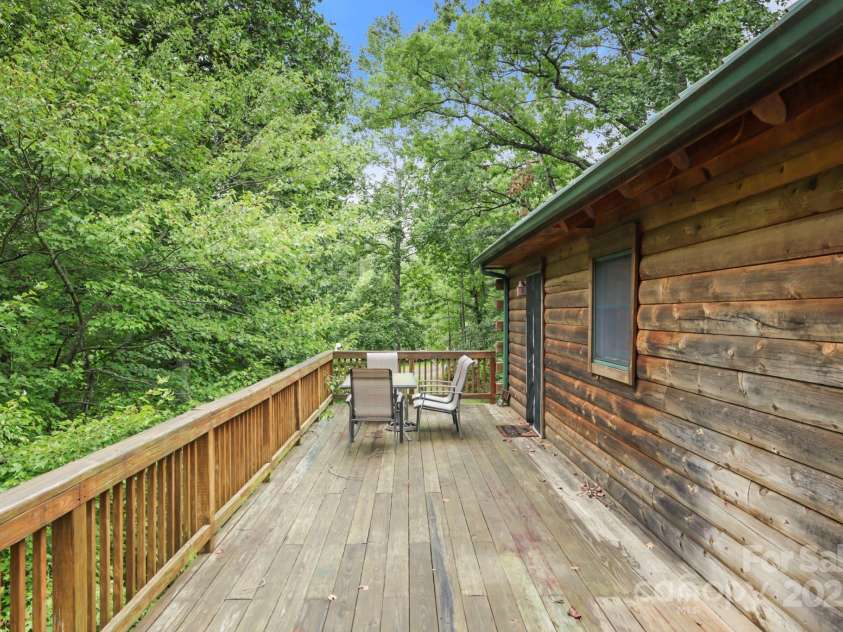 266 Rhododendron Drive, Saluda, NC 28773.  MLS# CAR4288597, YatesRealty ID 30762. Huge back deck