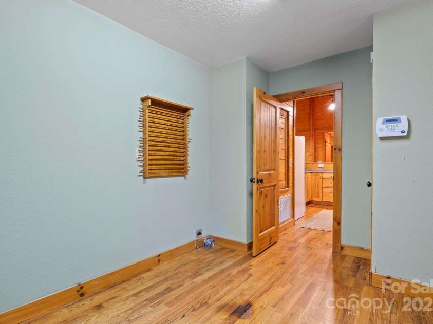 266 Rhododendron Drive, Saluda, NC 28773.  MLS# CAR4288597, YatesRealty ID 30762. Main level laundry