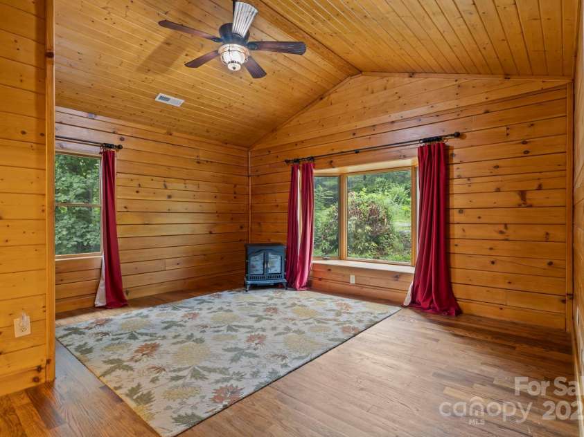 266 Rhododendron Drive, Saluda, NC 28773.  MLS# CAR4288597, YatesRealty ID 30762. Main level primary BR