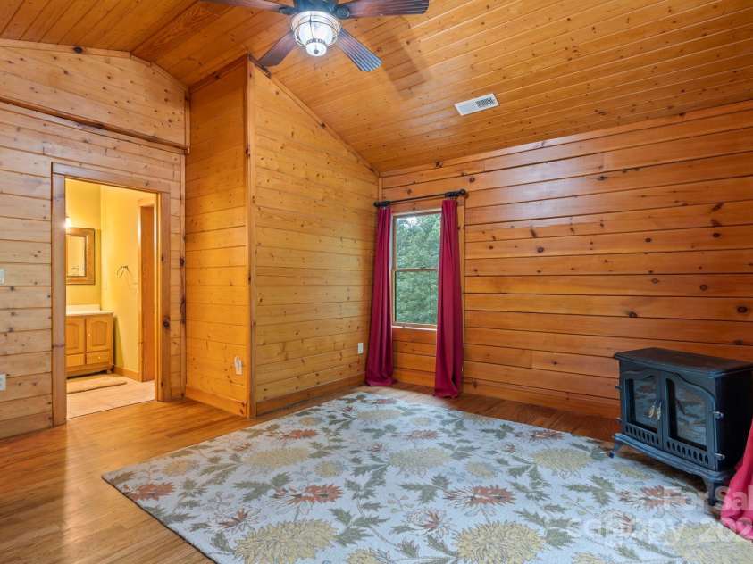 266 Rhododendron Drive, Saluda, NC 28773.  MLS# CAR4288597, YatesRealty ID 30762. Main level primary BR