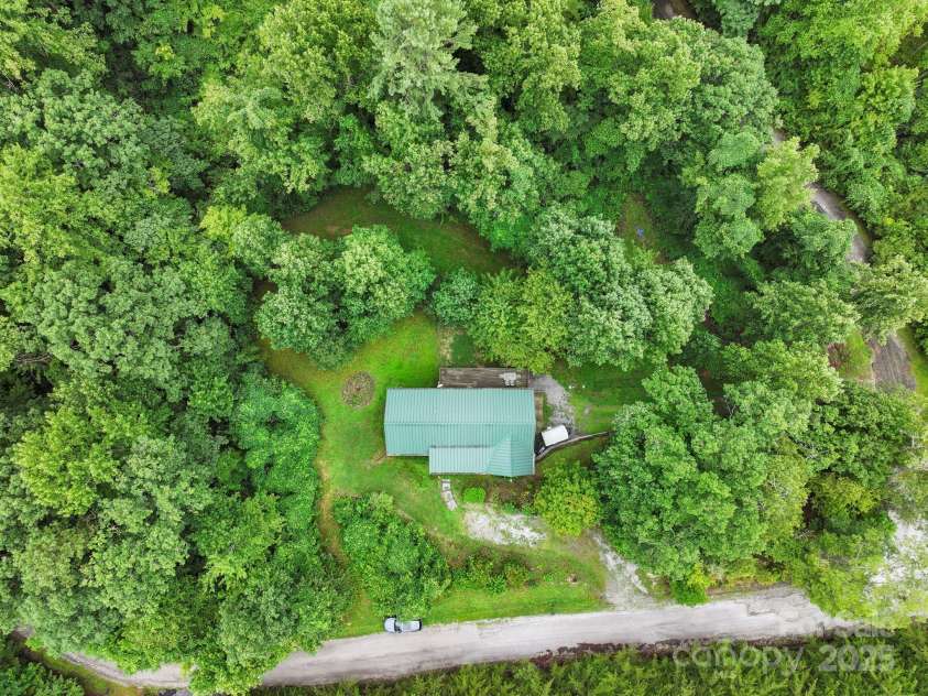 266 Rhododendron Drive, Saluda, NC 28773.  MLS# CAR4288597, YatesRealty ID 30762. Private serenity