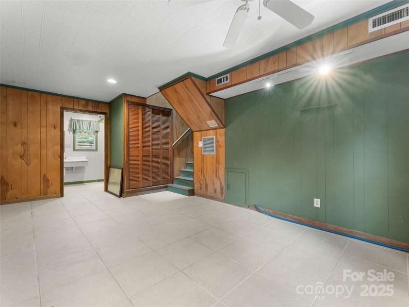 138 Stillwagon Lane, Cedar Mountain, NC 28718.  MLS# CAR4288259, YatesRealty ID 30766. Basement Flex Space