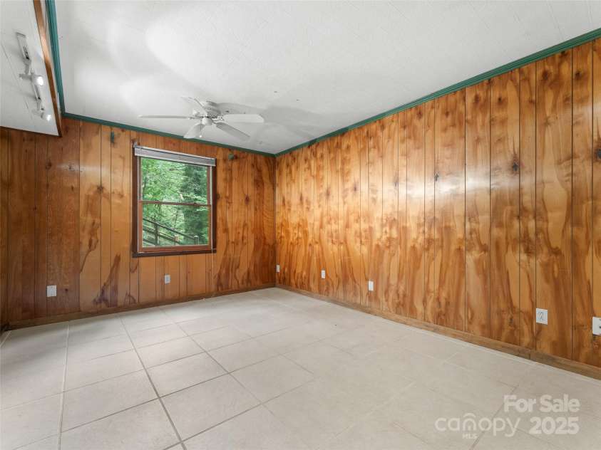 138 Stillwagon Lane, Cedar Mountain, NC 28718.  MLS# CAR4288259, YatesRealty ID 30766. Basement Flex Space