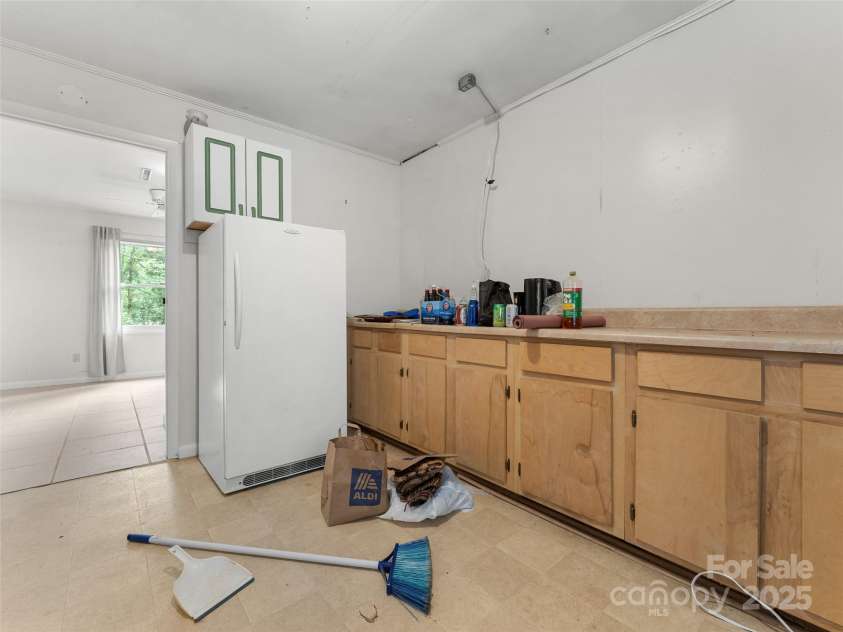 138 Stillwagon Lane, Cedar Mountain, NC 28718.  MLS# CAR4288259, YatesRealty ID 30766. Basement Second Kitchen