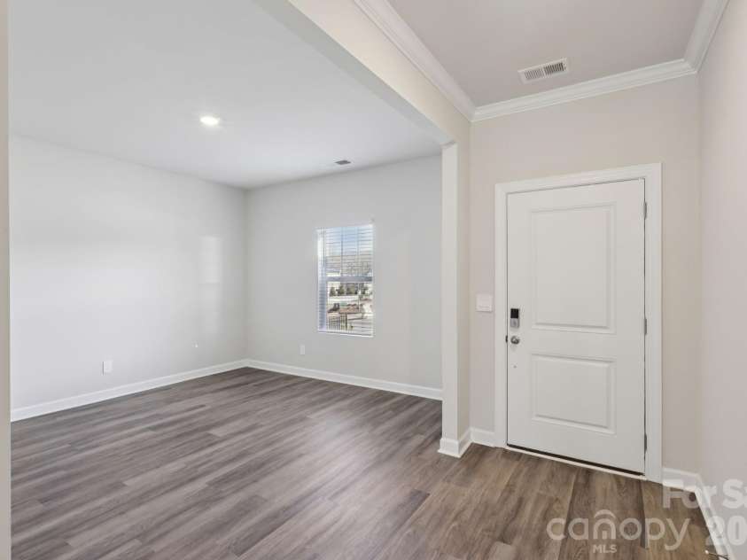 1605 Harper Landing Boulevard, Stanley, NC 28164.  MLS# CAR4394176, YatesRealty ID 30768. Photo is not of the actual home, but is an inspirational photo of builder’s model home and may depict options, furnishings, and/or decorator features that are not included