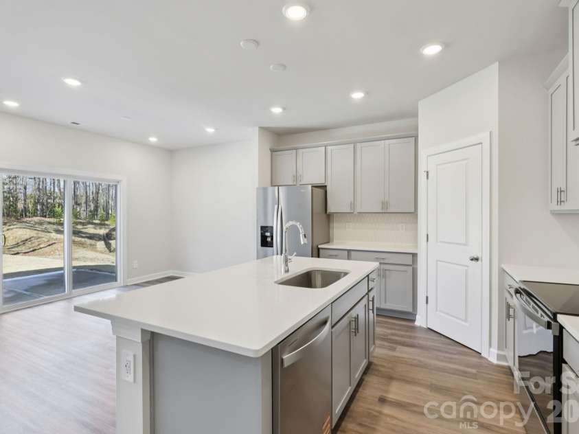 1605 Harper Landing Boulevard, Stanley, NC 28164.  MLS# CAR4394176, YatesRealty ID 30768. Photo is not of the actual home, but is an inspirational photo of builder’s model home and may depict options, furnishings, and/or decorator features that are not included