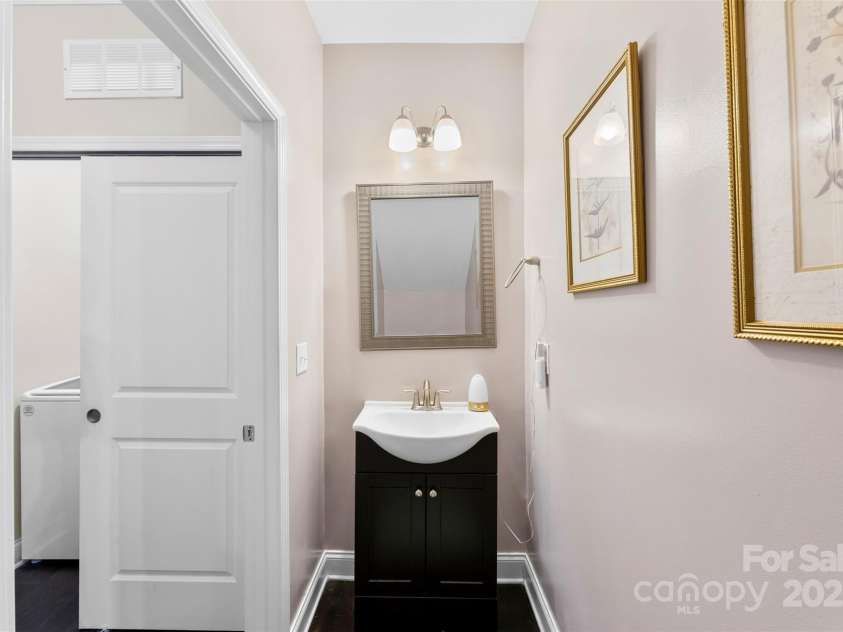 1206 Croft Drive, Fort Mill, SC 29708.  MLS# CAR4280268, YatesRealty ID 3077. Half bath with laundry room beside it