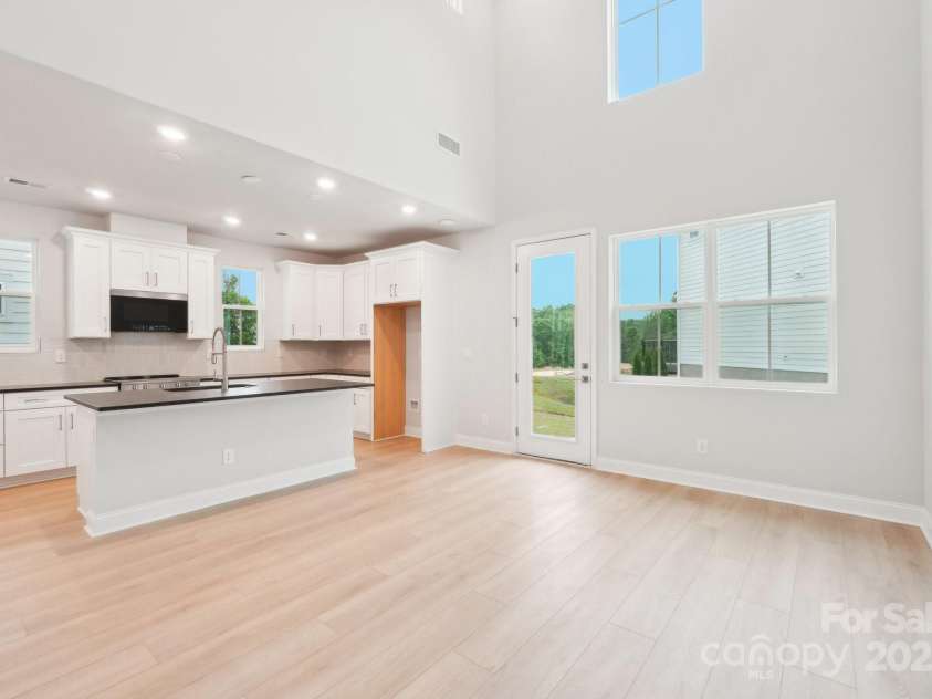 816 Terra Drive, Tega Cay, SC 29708.  MLS# CAR4289553, YatesRealty ID 30770. Great room to kitchen