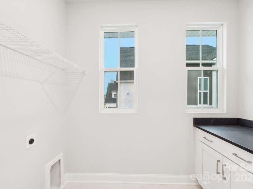 816 Terra Drive, Tega Cay, SC 29708.  MLS# CAR4289553, YatesRealty ID 30770. Laundry room