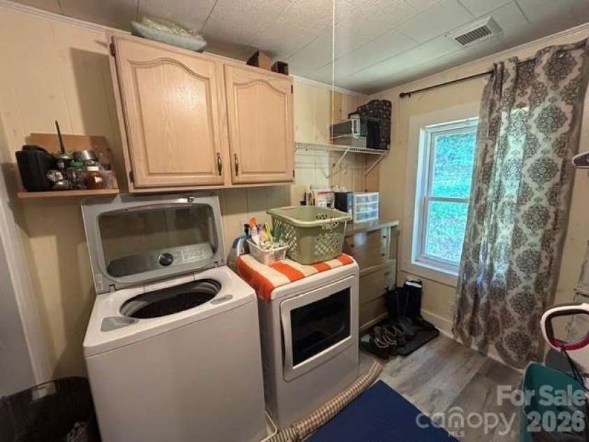 726 Israel Road, Brevard, NC 28712.  MLS# CAR4392517, YatesRealty ID 30772. Closet and laundry area
