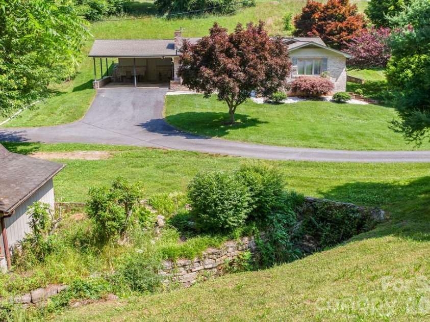293 Dillardtown Road, Sylva, NC 28779.  MLS# CAR4392955, YatesRealty ID 30775. 293 Dillardtown Road from main road