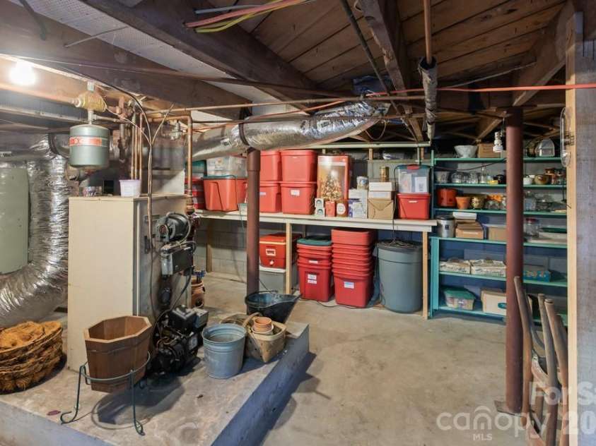 293 Dillardtown Road, Sylva, NC 28779.  MLS# CAR4392955, YatesRealty ID 30775. Ample storage in a clean and dry basement