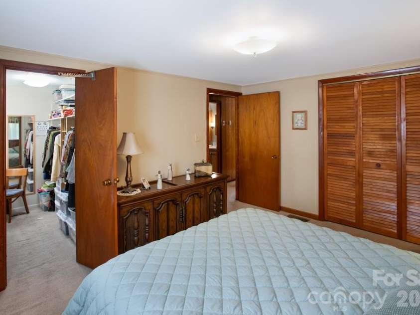 293 Dillardtown Road, Sylva, NC 28779.  MLS# CAR4392955, YatesRealty ID 30775. Bedroom 2 features a large walk-in with dressing area
