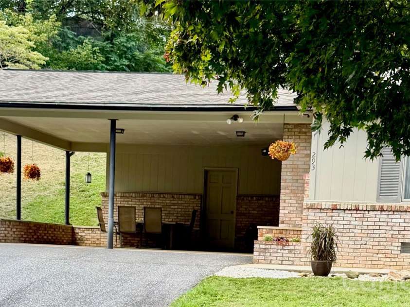 293 Dillardtown Road, Sylva, NC 28779.  MLS# CAR4392955, YatesRealty ID 30775. Covered double carport