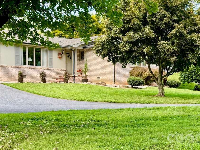 293 Dillardtown Road, Sylva, NC 28779.  MLS# CAR4392955, YatesRealty ID 30775. Home from outbuilding