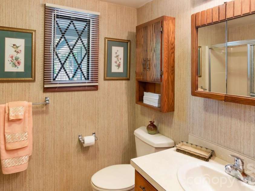 293 Dillardtown Road, Sylva, NC 28779.  MLS# CAR4392955, YatesRealty ID 30775. Primary Ensuite bath