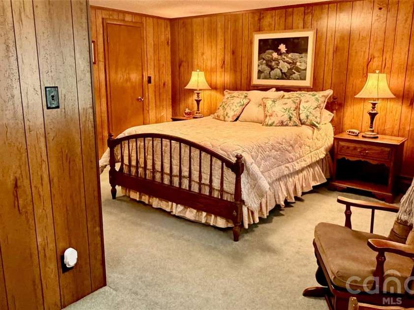 293 Dillardtown Road, Sylva, NC 28779.  MLS# CAR4392955, YatesRealty ID 30775. Warm and spacious primary suite