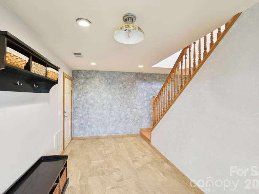 1426 Setzer Cove Road, Maggie Valley, NC 28751.  MLS# CAR4249259, YatesRealty ID 3078. Entryway w/ drop space or room for a desk or sitting area