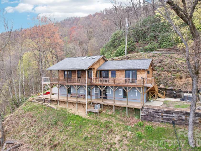 1426 Setzer Cove Road, Maggie Valley, NC 28751.  MLS# CAR4249259, YatesRealty ID 3078. Gorgeous view of both stories!