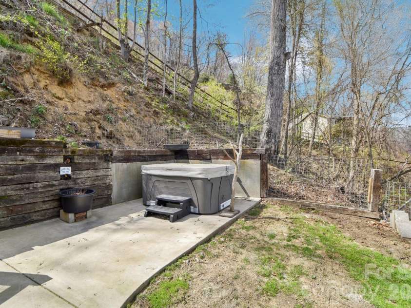 1426 Setzer Cove Road, Maggie Valley, NC 28751.  MLS# CAR4249259, YatesRealty ID 3078. Hot tub area