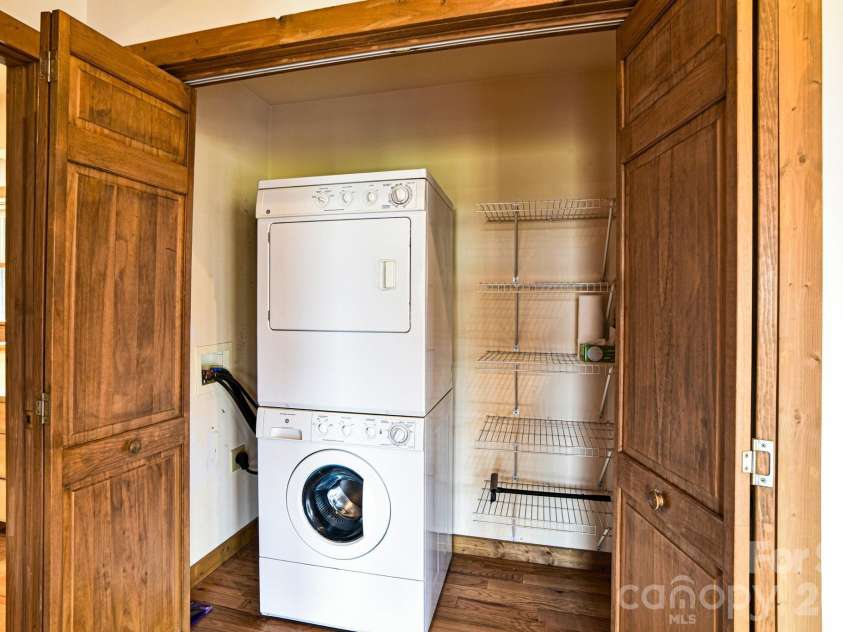 1426 Setzer Cove Road, Maggie Valley, NC 28751.  MLS# CAR4249259, YatesRealty ID 3078. Laundry area is off of the kitchen