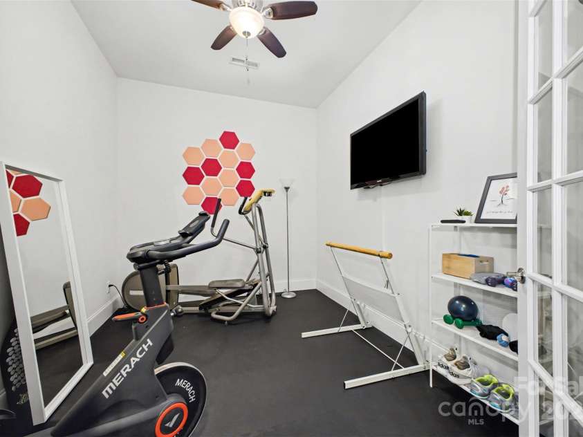 5410 Shannon Bell Lane, Charlotte, NC 28277.  MLS# CAR4326663, YatesRealty ID 30782. Downstairs flex space with French doors
