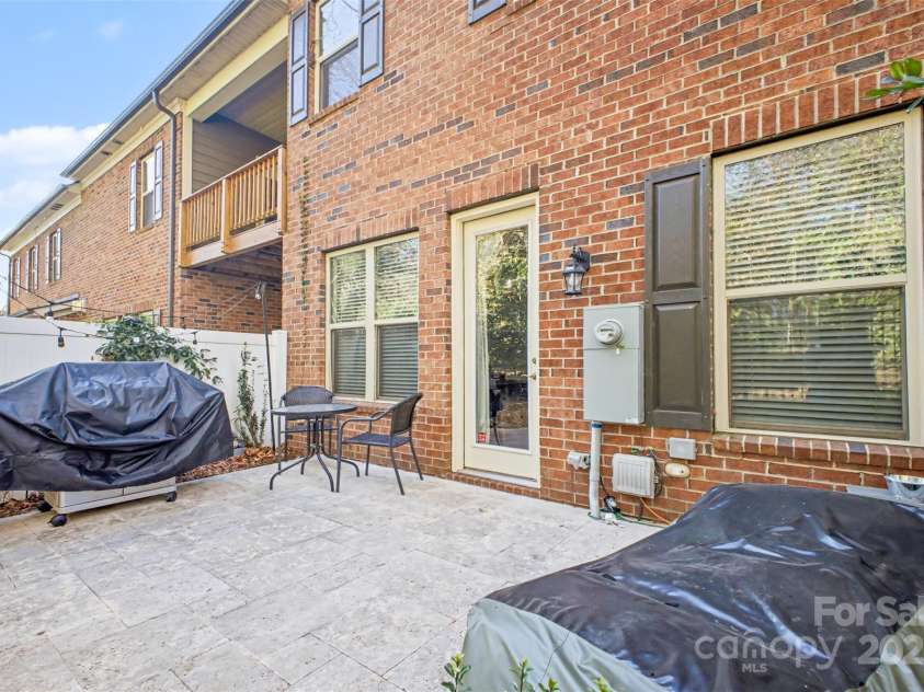 5410 Shannon Bell Lane, Charlotte, NC 28277.  MLS# CAR4326663, YatesRealty ID 30782. Private Travertine patio