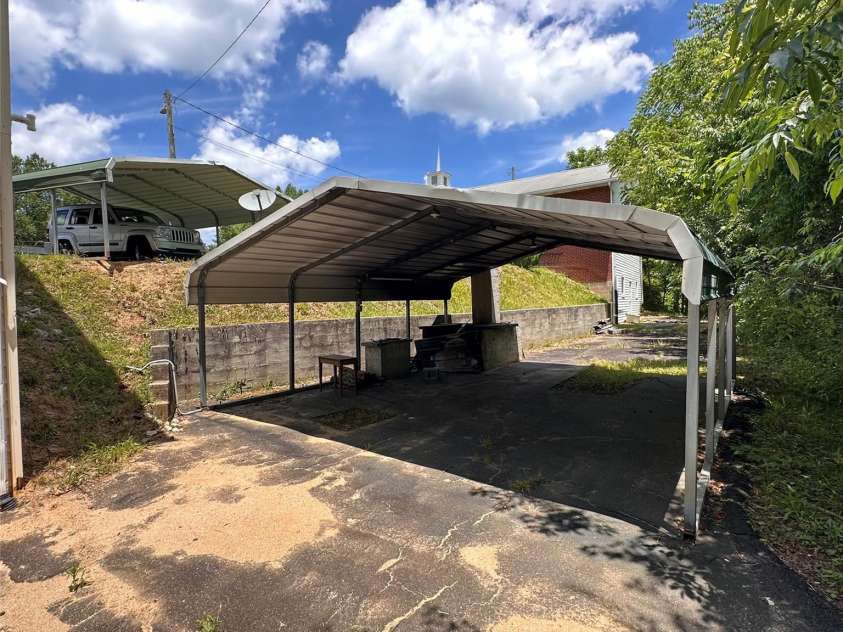 422 US Highway 19E Highway, Spruce Pine, NC 28777.  MLS# CAR4393925, YatesRealty ID 30791. Carport one