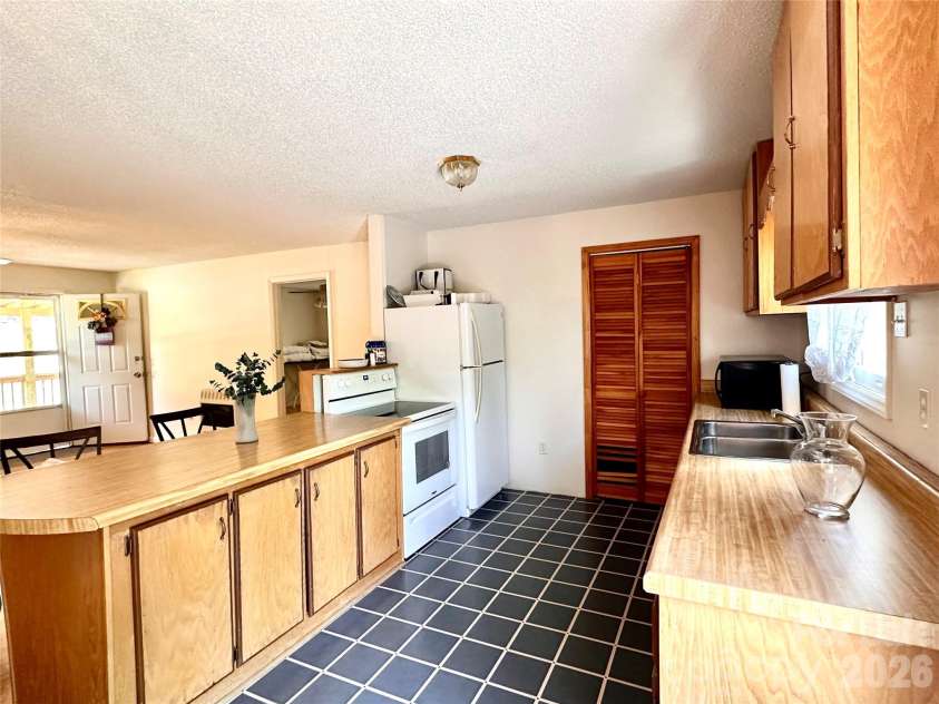 422 US Highway 19E Highway, Spruce Pine, NC 28777.  MLS# CAR4393925, YatesRealty ID 30791. House Kitchen-Main Level