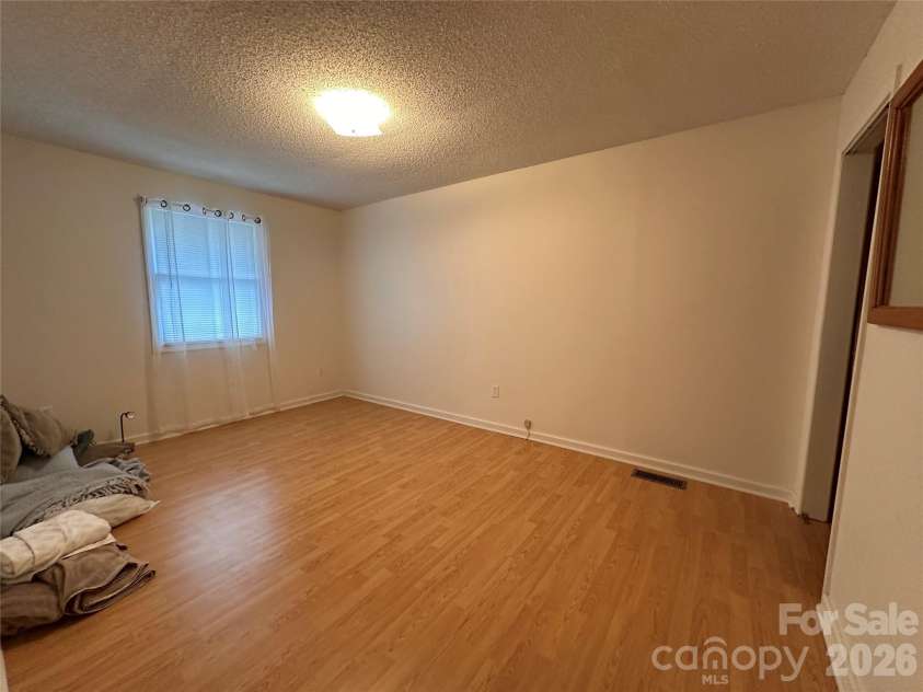 422 US Highway 19E Highway, Spruce Pine, NC 28777.  MLS# CAR4393925, YatesRealty ID 30791. Main Level-Bedroom
