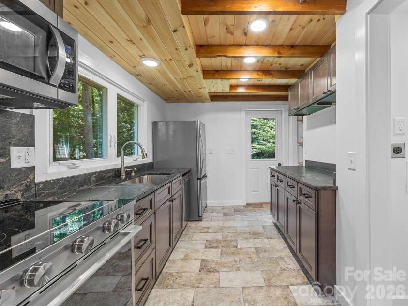 563 Burgess Road, Mill Spring, NC 28756.  MLS# CAR4394359, YatesRealty ID 30792. 