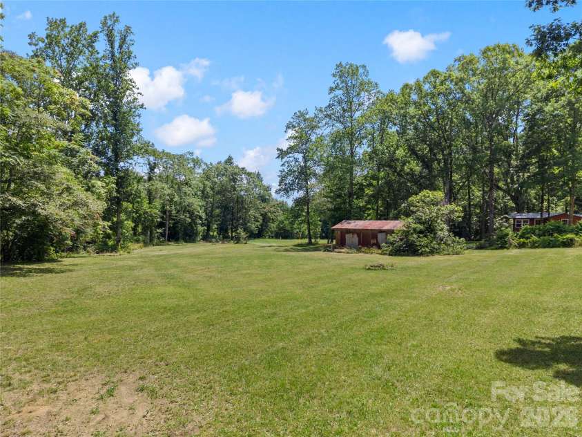 563 Burgess Road, Mill Spring, NC 28756.  MLS# CAR4394359, YatesRealty ID 30792. 