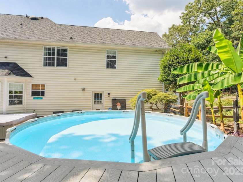 8056 Stevens Mill Road, Matthews, NC 28104.  MLS# CAR4286077, YatesRealty ID 30798. Relax in the Pool