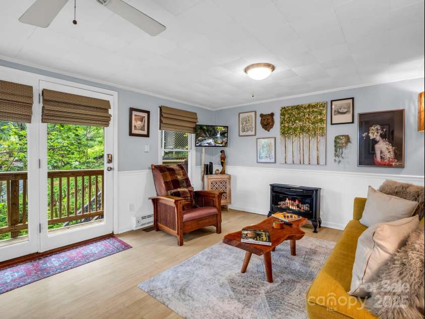 6 Delano Road, Asheville, NC 28805.  MLS# CAR4287073, YatesRealty ID 30799. Relax by the fire!