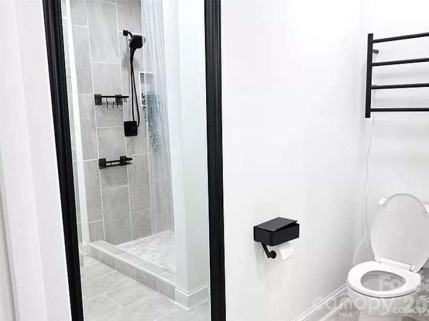 2524 Pickway Drive, Charlotte, NC 28269.  MLS# CAR4330657, YatesRealty ID 3080. Owner's Bathroom with Heated Towel Rack