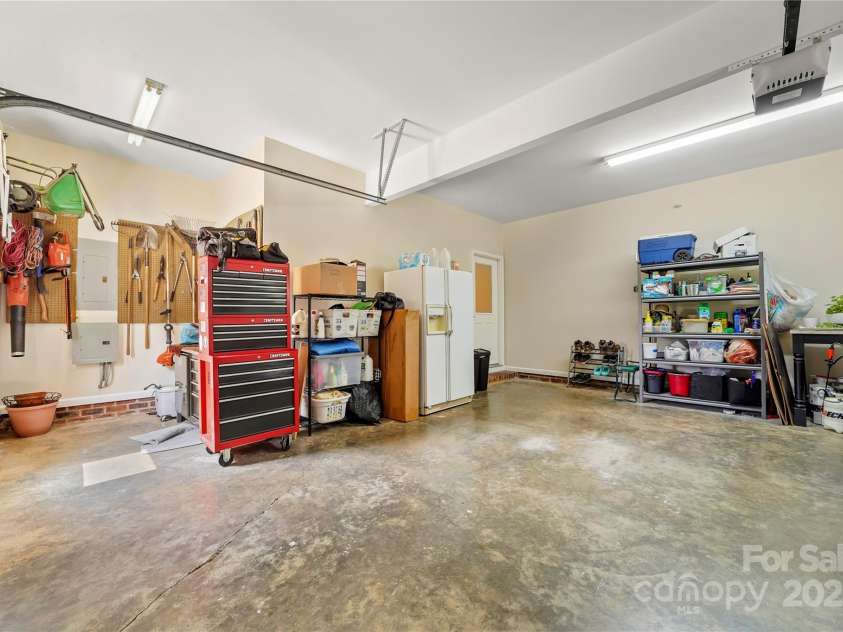 8173 Shannon Woods Lane, Weddington, NC 28104.  MLS# CAR4274910, YatesRealty ID 30803. 600+ square foot garage with extra storage