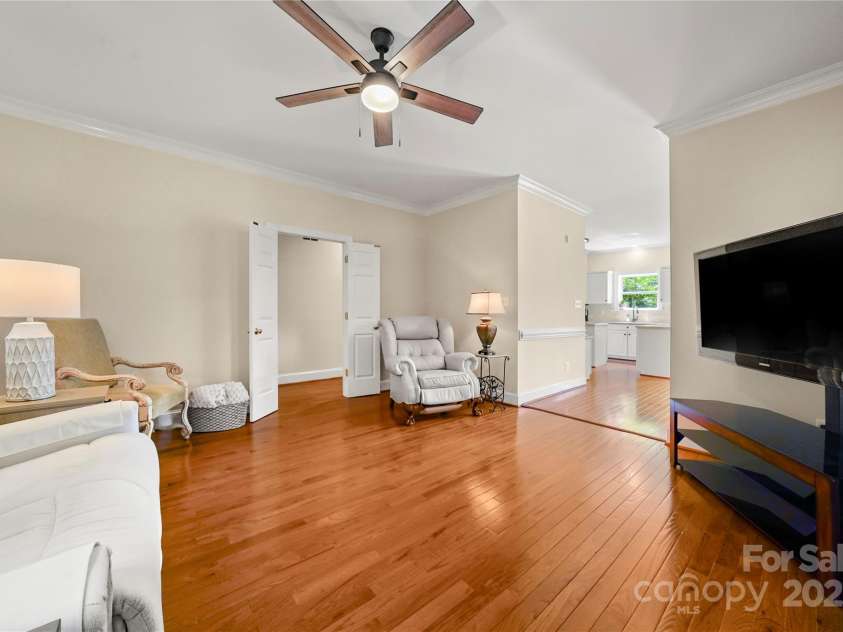 8173 Shannon Woods Lane, Weddington, NC 28104.  MLS# CAR4274910, YatesRealty ID 30803. Family room with new ceiling fan