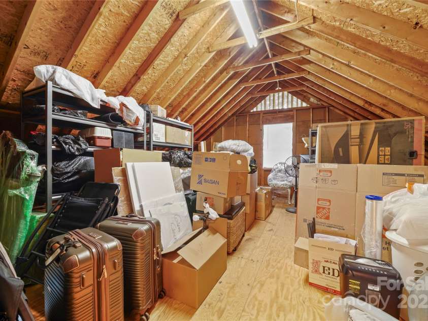 8173 Shannon Woods Lane, Weddington, NC 28104.  MLS# CAR4274910, YatesRealty ID 30803. One of two walk in storage rooms or it could be finished off for addtional rooms upstairs