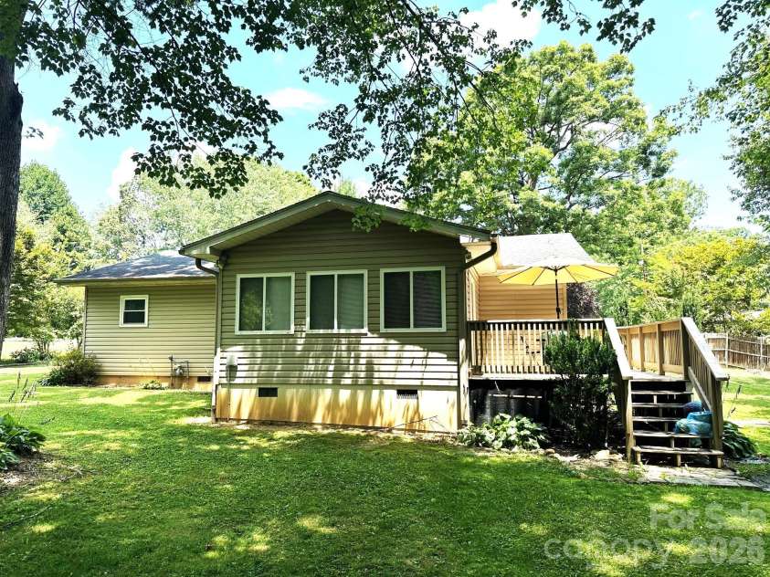 25 Norman Road, Fletcher, NC 28732.  MLS# CAR4278825, YatesRealty ID 3081. Back of house