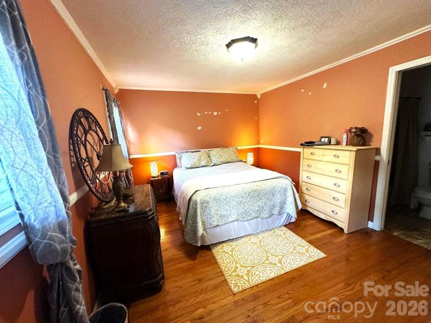 25 Norman Road, Fletcher, NC 28732.  MLS# CAR4278825, YatesRealty ID 3081. Primary bedroom