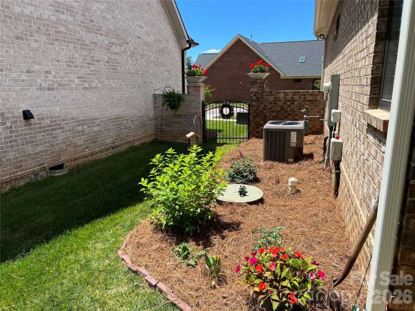 5124 Silver Trace Lane, Denver, NC 28037.  MLS# CAR4382264, YatesRealty ID 30810. Side court yard