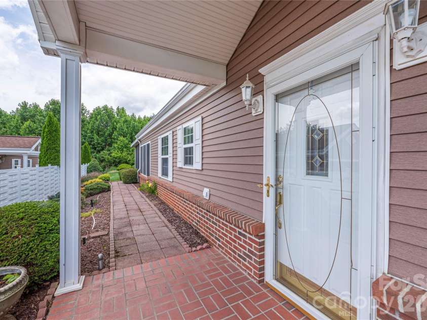 11 Heather Way, Candler, NC 28715.  MLS# CAR4381807, YatesRealty ID 30816. Front entrance