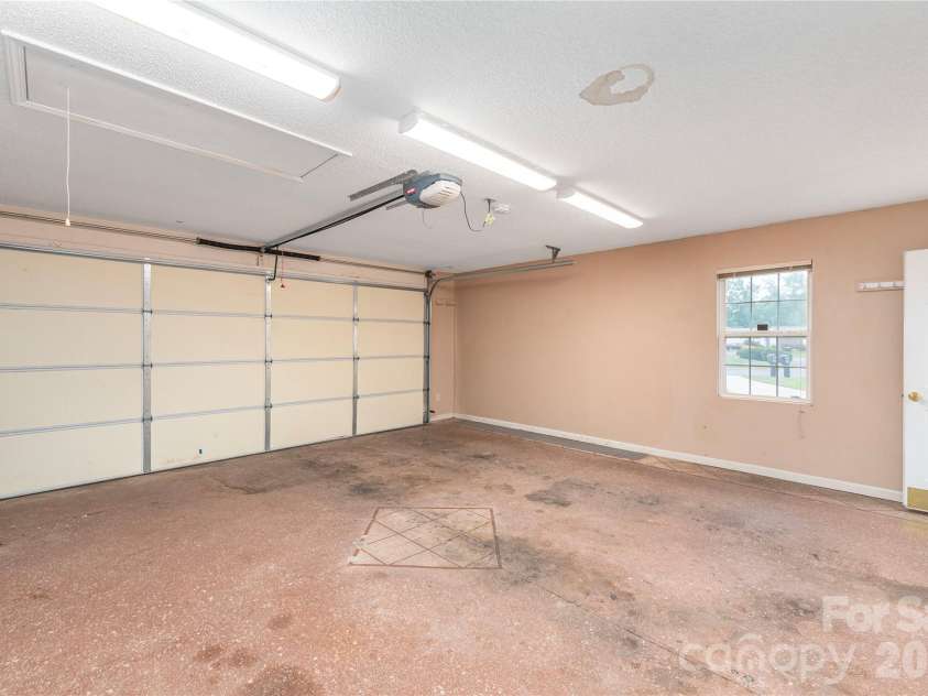 11 Heather Way, Candler, NC 28715.  MLS# CAR4381807, YatesRealty ID 30816. Garage